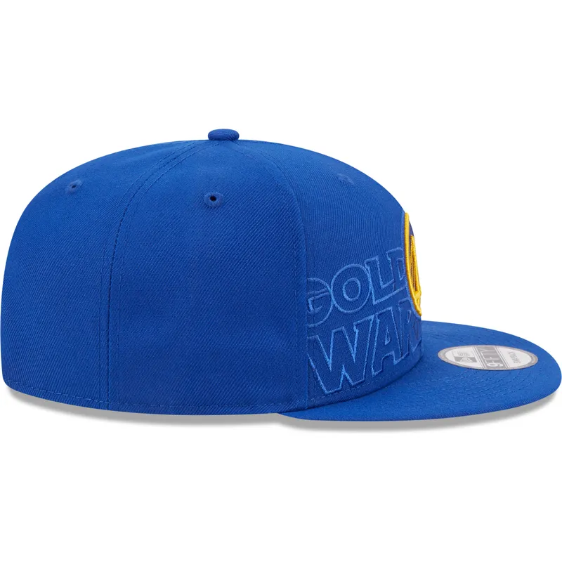 kapa-ravna-plava-snapback-9fifty-draft-edition-2023-golden-state-warriors-nba-new-era kapa-ravna-plava-snapback-9fifty-draft-edition-2023-golden-state-warriors-nba-new-era