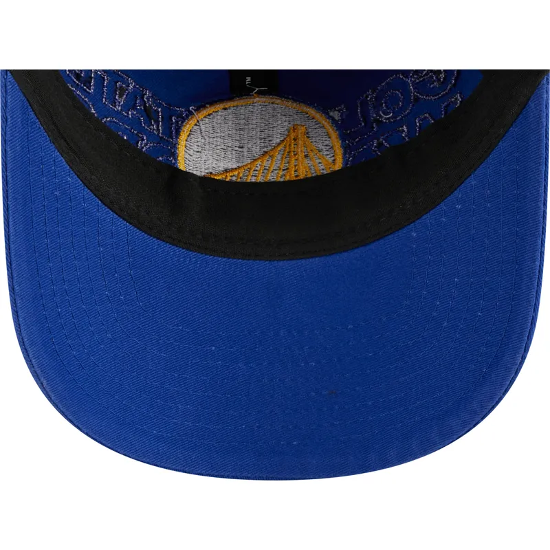 kapa-zaobljena-plava-podesiv-9twenty-draft-edition-2023-golden-state-warriors-nba-new-era kapa-zaobljena-plava-podesiv-9twenty-draft-edition-2023-golden-state-warriors-nba-new-era