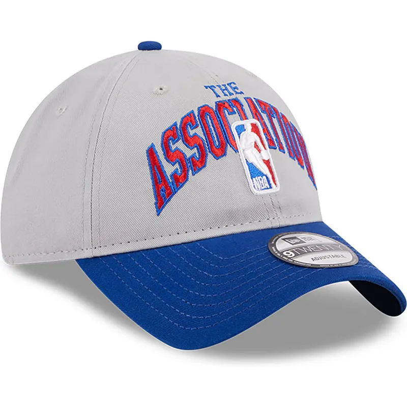 cap-zaobljena-gray-adjustable-strap-9twenty-tip-off-2023-nba-new-era