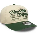 kapa-zaobljena-bez-podesiv-19twenty-washed-graphic-new-york-yankees-mlb-new-era