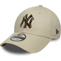 cap-zaobljena-beige-adjustable-strap-9forty-camo-infill-new-york-yankees-mlb-new-era